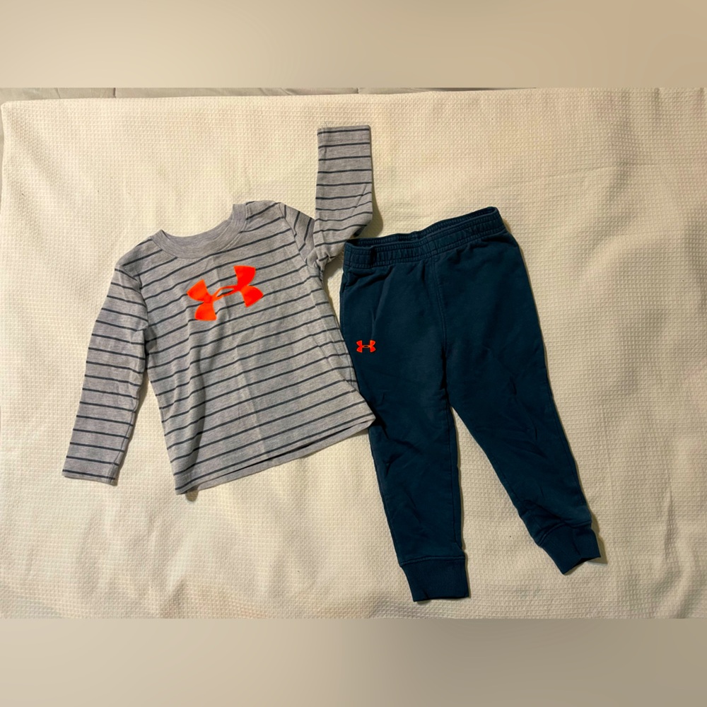 Under Armour pant set. Boys size 18M. Blue and gray with orange logos.